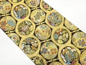 京藝製　変わり亀甲に丸文・花々模様織出し袋帯